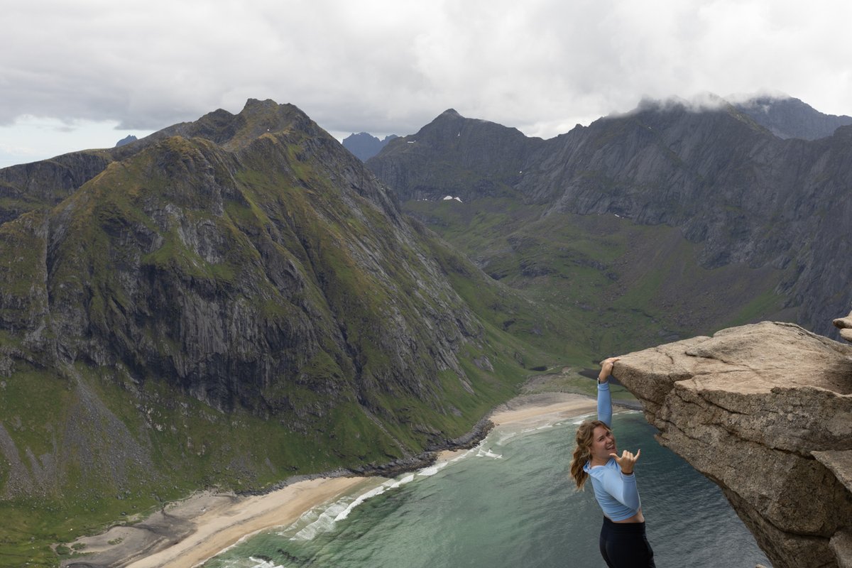 Man climbing along a cliff edge